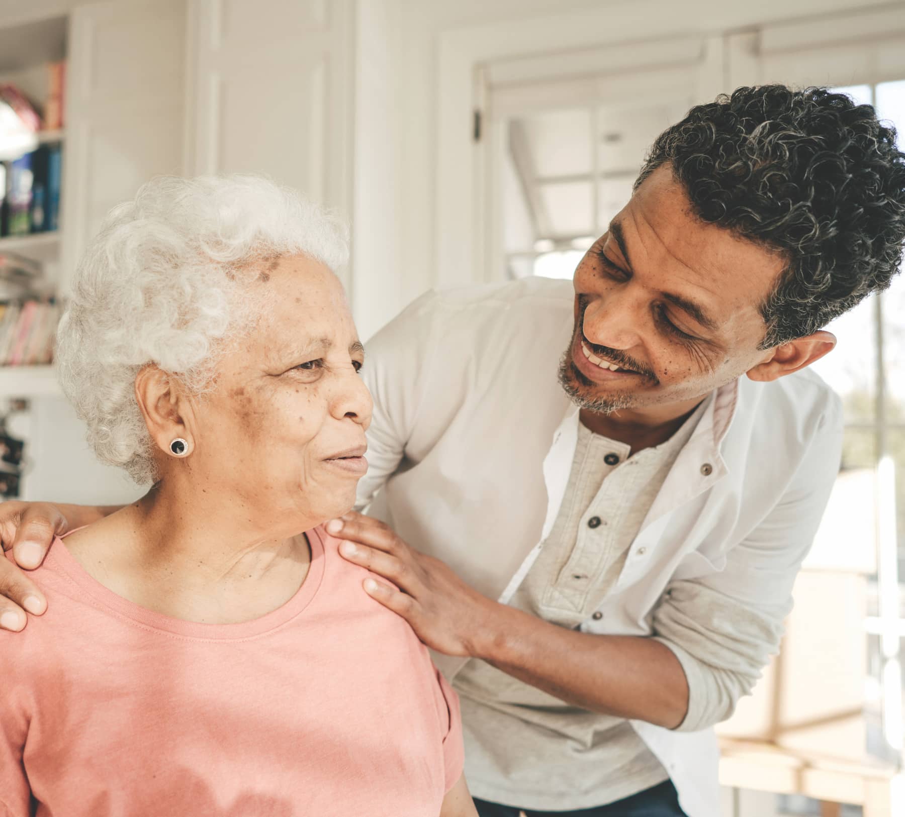 Caregiver embracing a patient